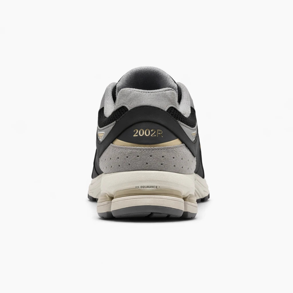 New Balance 2002R Black Sea Salt Gold Metallic